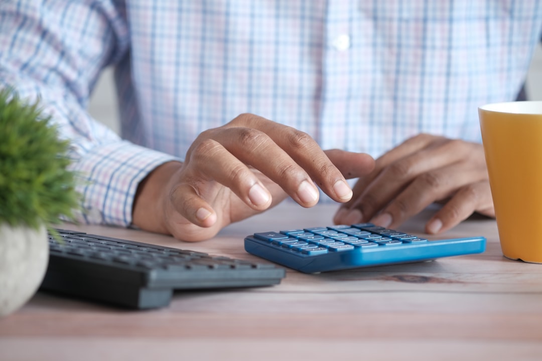 Contractor calculating a whole house renovation budget