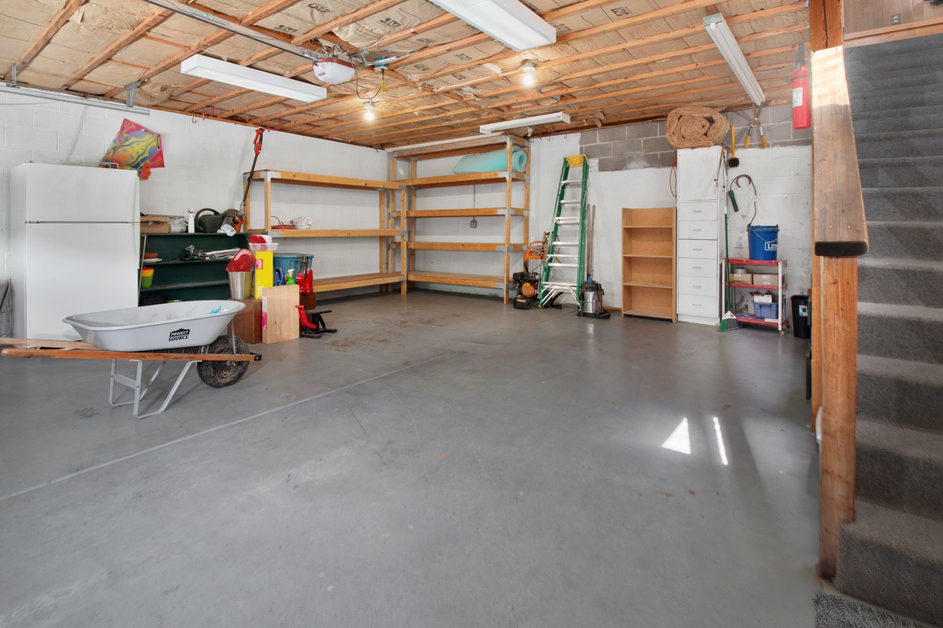 Renovated garage interior with organized storage